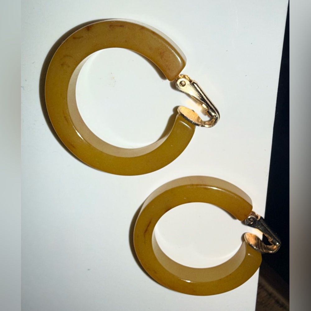 Authentic tested Bakelite clip on earrings! Simichrome test photo shown. EUC